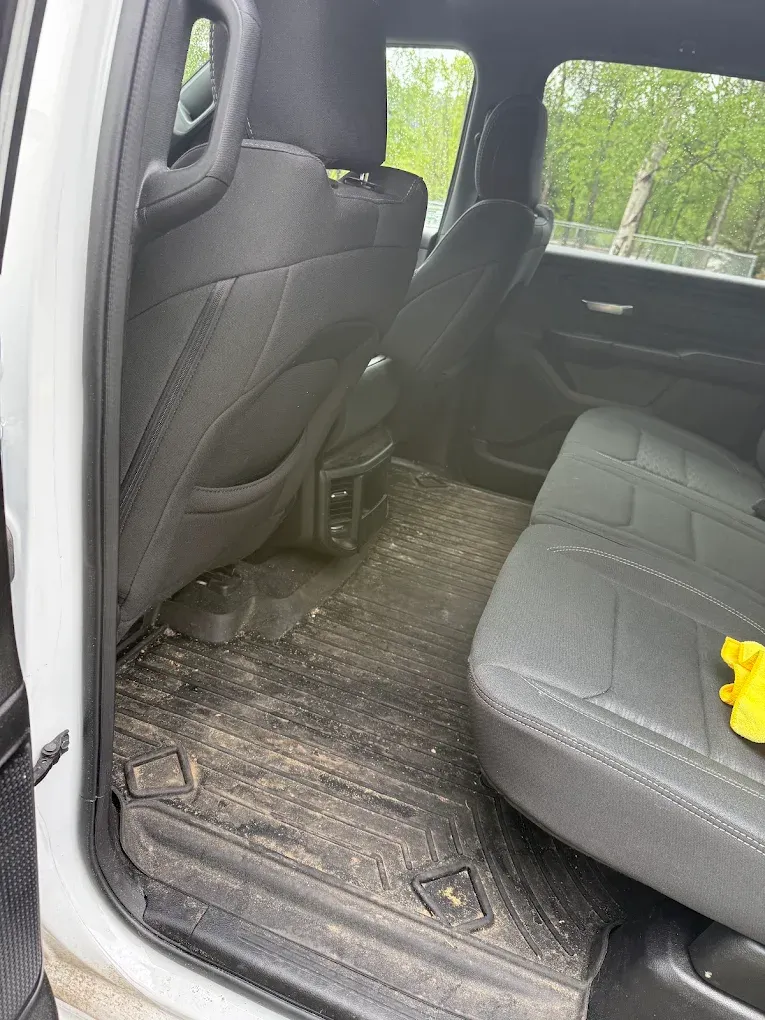 Truck floor carpet and mats being deep cleaned