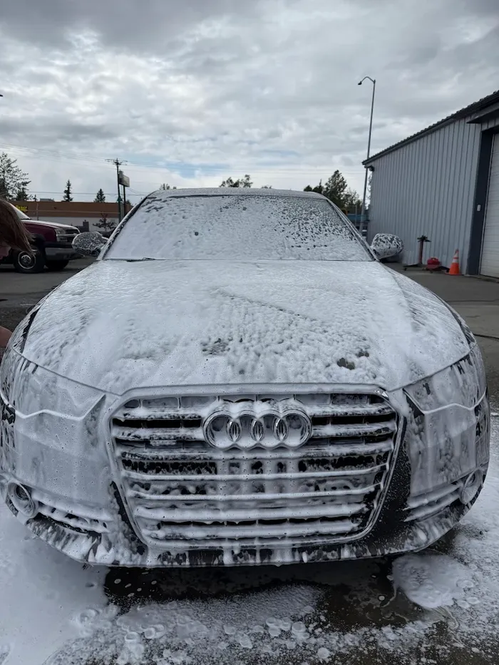 Foam-cannon wash during an exterior car detail in Anchorage