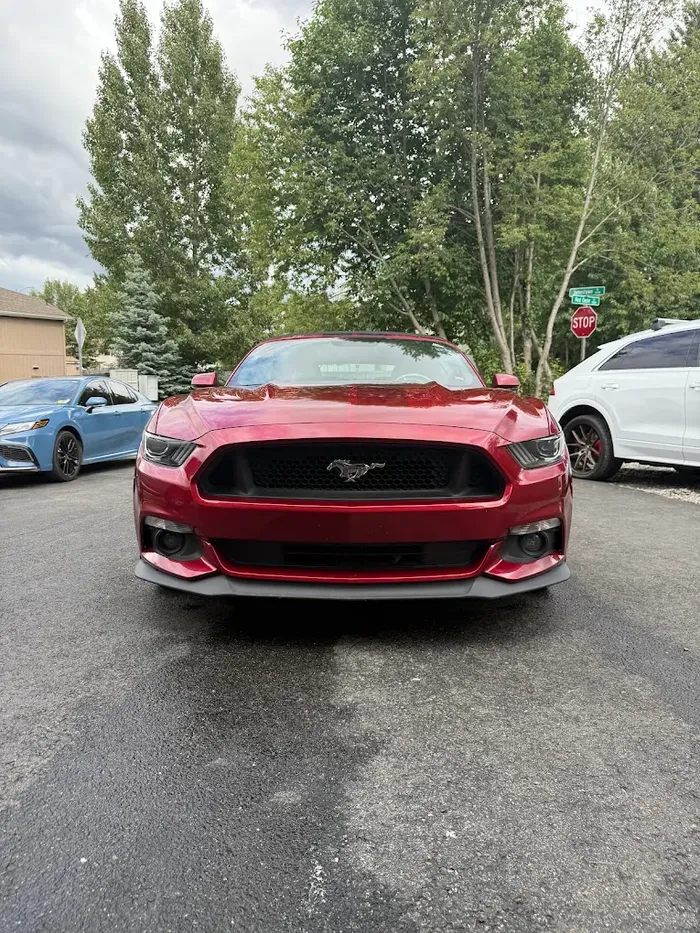 Glossy red Ford Mustang after a mobile detail in Anchorage