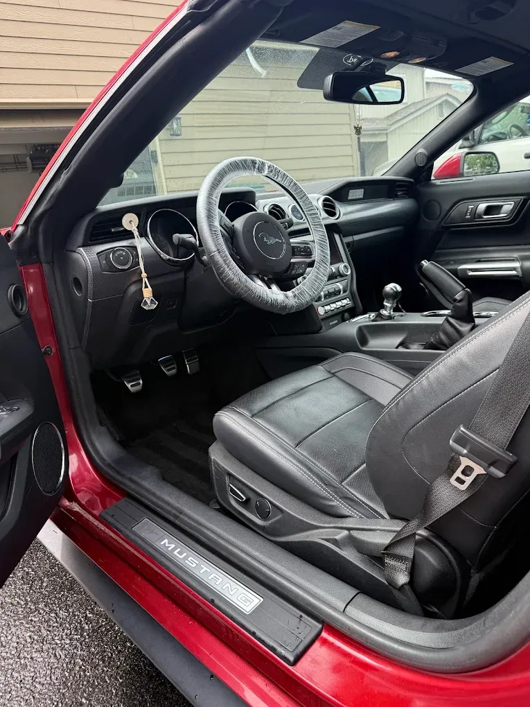 Detailed sports-car interior after a full detail